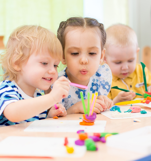 Children playing at a table