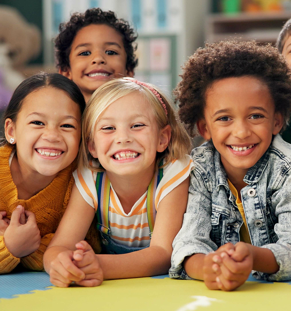 Kids smiling at the camera